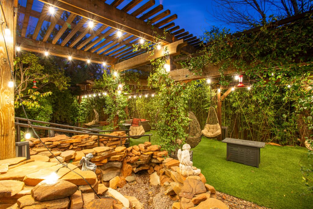 Cozy love seats and swinging chairs at the Lantern Light Inn and Wedding Gardens in Sedona