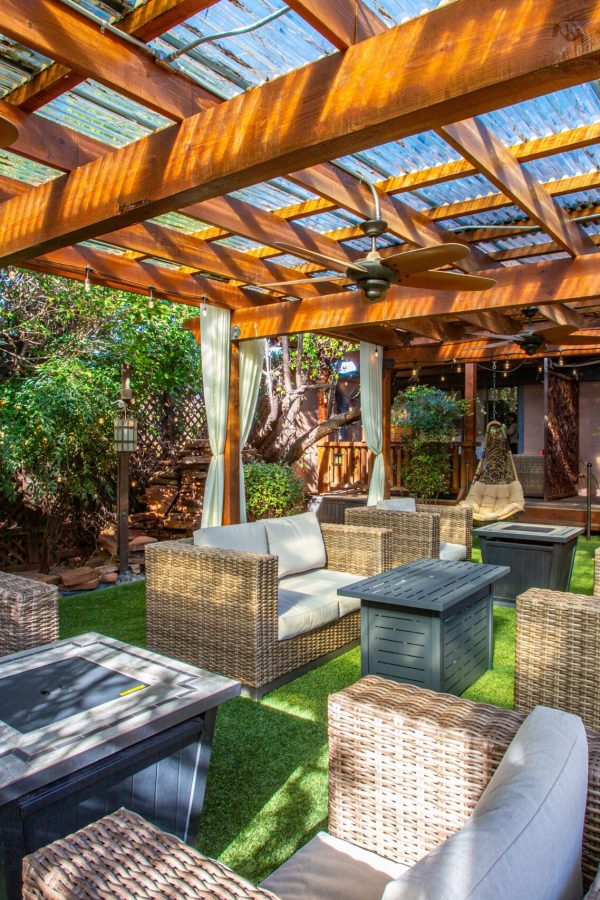 Fire pit and cozy love seats at the Lantern Light Inn and Wedding Gardens in Sedona